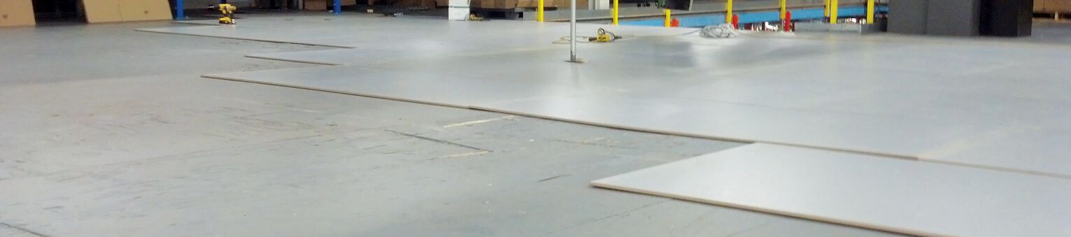 Damaged Warehouse Floors Being Repaired with ResinDek Panels